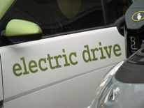 An electric car being recharged