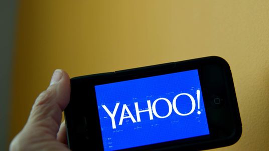Yahoo's logo on a smartphone screen.