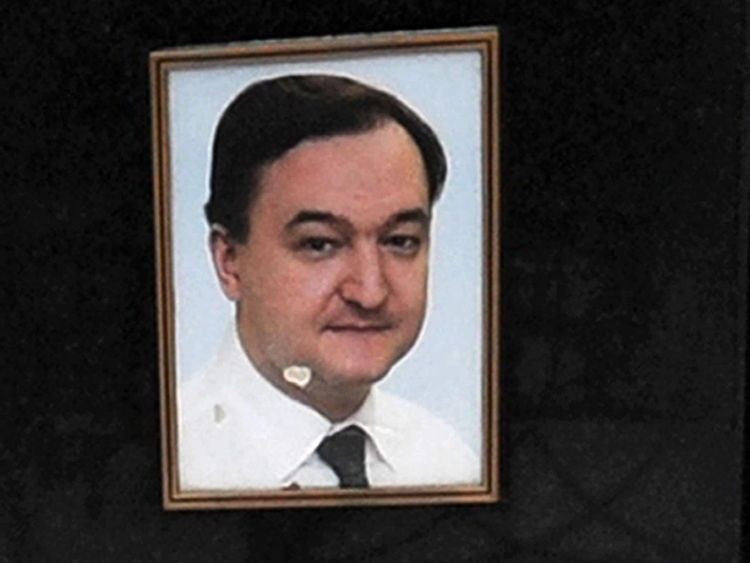 A close up of Russian lawyer Sergei Magnitsky's portrait on the grave
