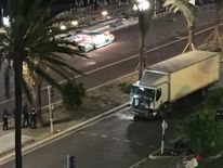 Picture from @Nice_Matin Twitter account showing a damaged truck in the aftermath 