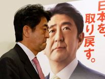 Japan's next PM Shinzo Abe attends a news conference in Tokyo