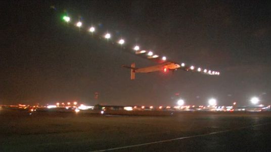 The plane takes off in the Cairo darkness