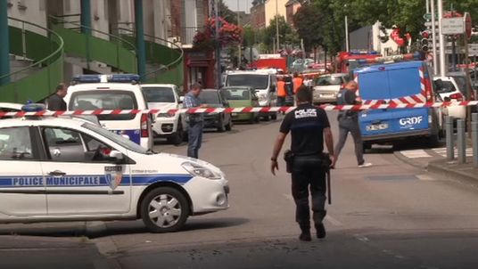 Police at the scene in Saint-Etienne-du-Rouvray