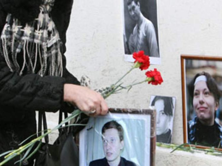 Flowers placed at the spot where Stanislav Markelov and Anastasiya Baburova were gunned down