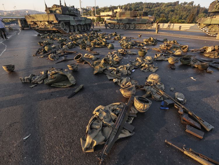 Clothes and weapons belonging to soldiers involved in the coup attempt are left on the street