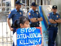Protests against the killings have been held outside the country&#39;s Department of Justice 
