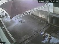 Video allegedly showing the swimmers sat by the station. Pic: Globo TV