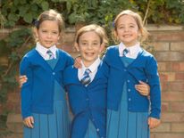 Rosie (L) and Ruby (R) Formosa with big sister Lily in the middle