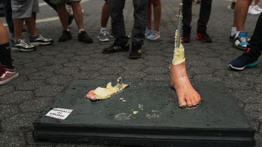  A molded foot is all that remains of a statue of naked GOP presidential candidate Donald Trump that appeared in Union Square Park, New York City