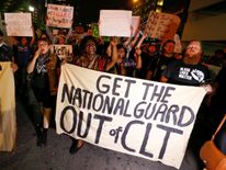 Demonstrators in the streets during another night of protests over the police shooting of Keith Scott in Charlotte, North Carolina