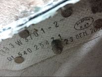Part number and date stamp on outboard flap of missing Malaysia Airlines jet MH370 found in Tanzania. Pic: Australia Transport Safety Bureau