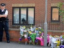 Flowers at the scene in Chadwell Heath, east London, where Ricky Hayden was fatally stabbed