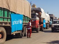 The picture shows the aid convoy en route to Urum al-Kubra before the air strike