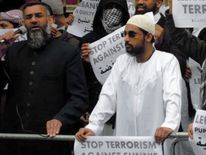 Anjem Choudary, left, and Mohammed Mizanur Rahman at a rally together