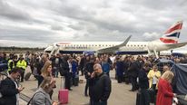 Passengers on the tarmac at London City Airport