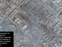 Smoke is seen in this satellite image of the city of Mosul in Iraq
