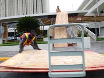 Jamaicans are battening down windows and doors in preparation for the Hurricane's arrival