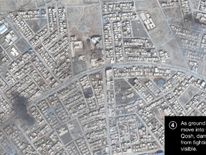 Smoke is seen in this satellite image of the city of Mosul in Iraq