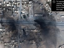 Smoke is seen in this satellite image of the city of Mosul in Iraq