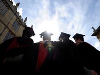 A group of Oxford University graduates celebrate