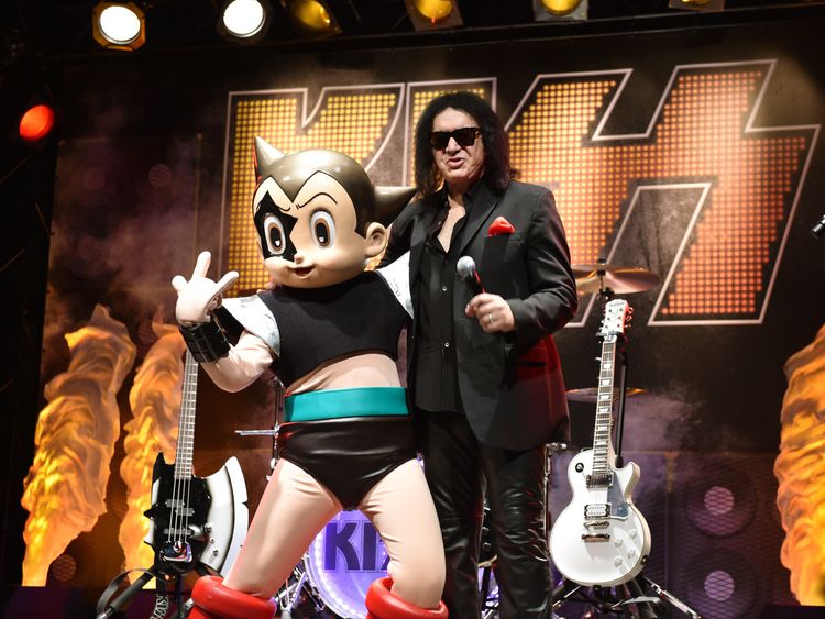 Gene Simmons of KISS poses with Japan&#39;s animation character Astro Boy as the exhibition Kiss Expo Tokyo 2016 is announced in the Japanese capital