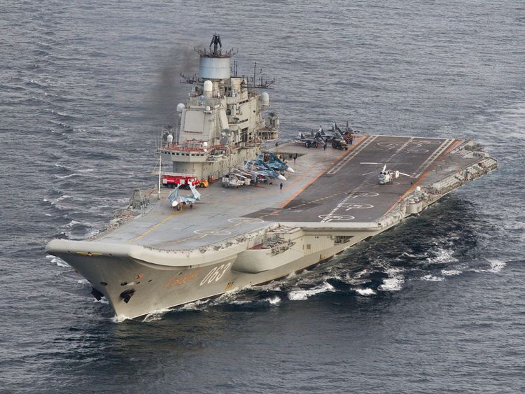 A photo taken from a Norwegian surveillance aircraft shows Russian aircraft carrier Admiral Kuznetsov in international waters off the coast of Northern Norway