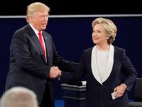 Donald Trump and Hillary Clinton shake hands
