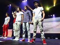 Zayn during a concert with One Direction in 2012