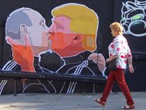 A mural on a restaurant wall in Lithuania showing Donald Trump and Vladimir Putin, which followed warm campaign comments by the former towards Russia