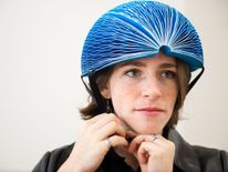 Eco helmet inventor Isis Shiffer demonstrates how the helmet works