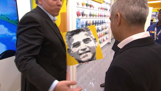 London mayor Sadiq Khan with a Lego portrait at its new Leicester Square store