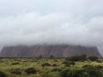 Storm clouds hang over Uluru. Pic: @BiancaH80 and @waginski