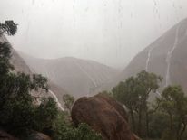 Waterfalls run down Uluru. Pic: @BiancaH80 and @waginski