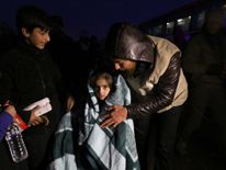 Evacuees from a rebel-held area of Aleppo arrive at insurgent-held al-Rashideen, Syria December 21, 2016