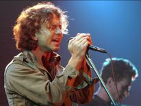 Pearl Jam lead singer Eddie Vedder peforming in 2000