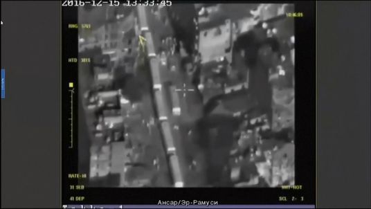 Russian planes monitor the convoy preparing to leave Aleppo