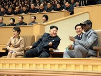 Kim Jong-Un watches a basketball game with Dennis Rodman in 2014