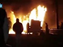 The bus crashed into barriers and burst into flames