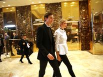 Jared Kushner with his wife Ivanka in the lobby of Trump Tower