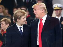 U.S. President Donald Trump stands with his son Barron Trump