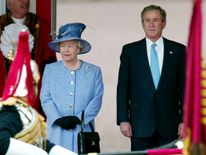 U.S. President George W. Bush stands with Queen Elizabeth at Buckingham Palace, November 19, 2003
