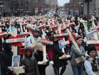 People march in Chicago to remember those shot dead in the city in 2016