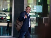 Goncalo Amaral leaving a court in Lisbon in 2014
