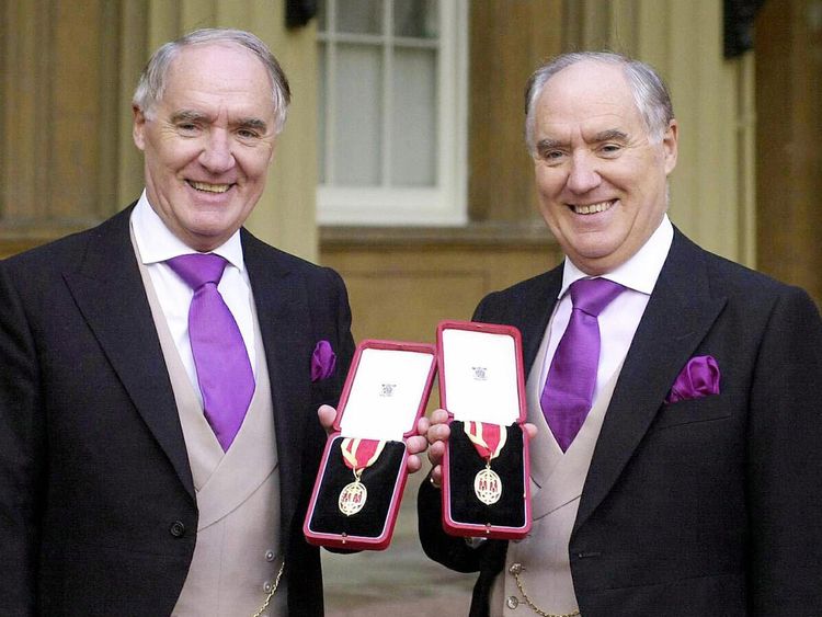 The Barclay brothers receiving their knighthoods in 2000