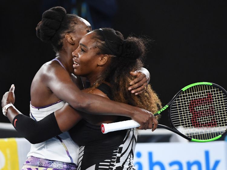 Serena and Venus hug after the Australian Open final