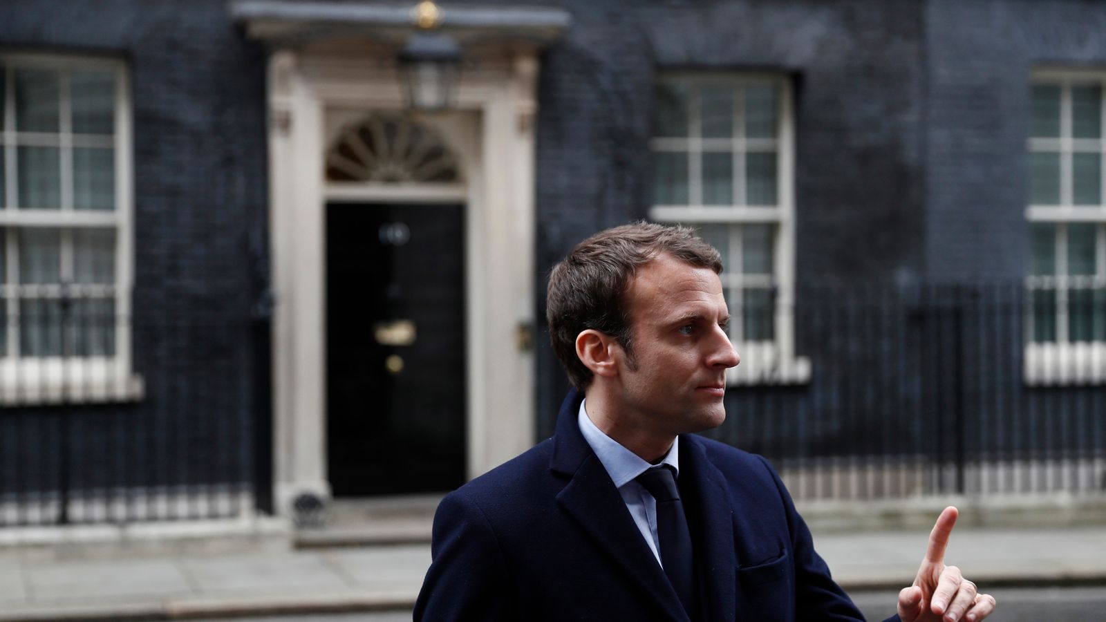Emmanuel Macron speaks to media outside Number 10