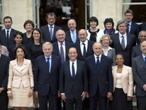 Mr Hamon (back left) spent more than two years in the president's cabinet