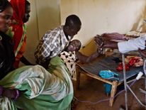 Injured refugees and soldiers in the joint S.Sudan/Goal administered clinic in Bunj, Maban in the Upper Nile Blue Nile state of northeastern South Sudan, Africa