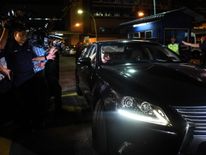 A North Korean embassy official leaves Kuala Lumpur General hospital