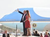 US President Donald Trump and First Lady Melania Trump arrive for a rally on February 18, 2017 in Melbourne, Florida